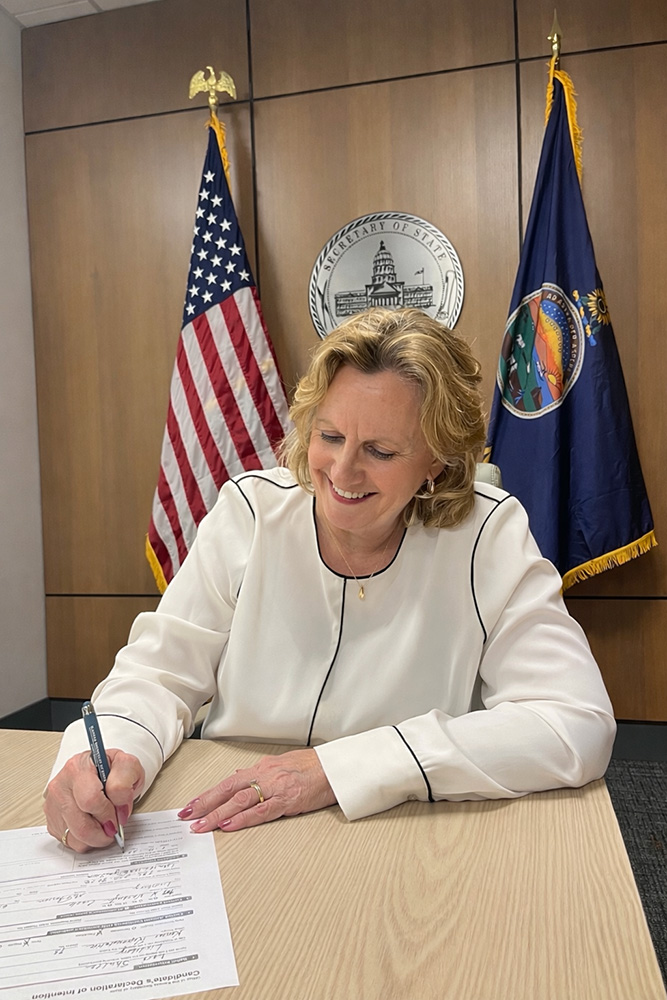 Lori Shultz signing legislation